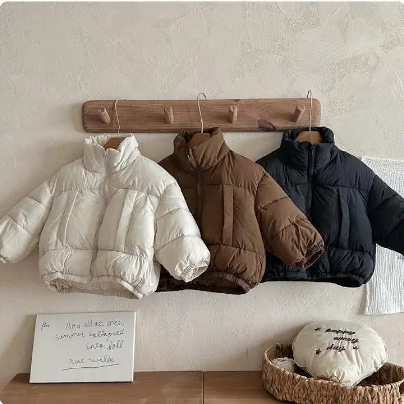 Child wearing 2025 winter cotton-padded jacket
