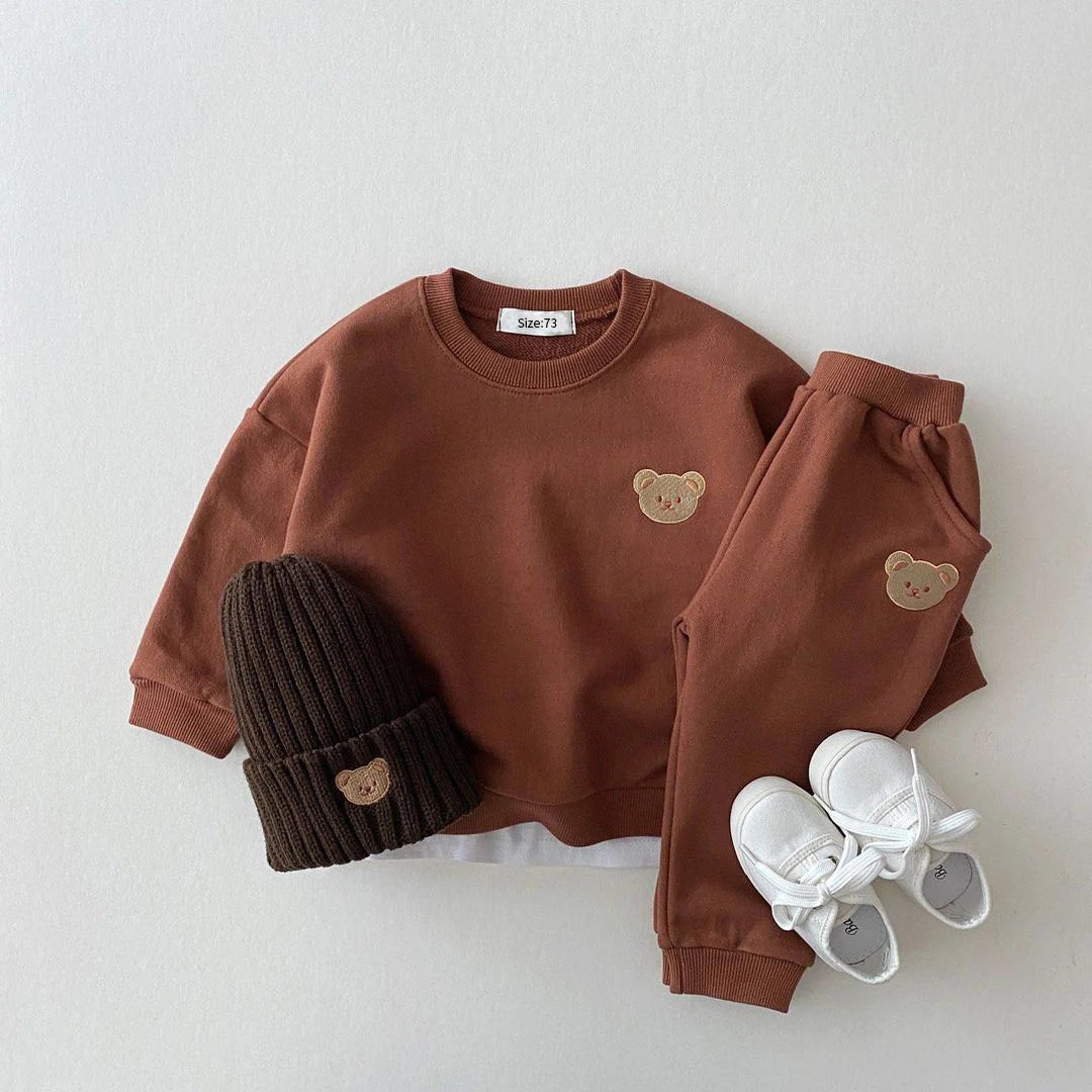 Toddler wearing winter fleece pullover and pants set