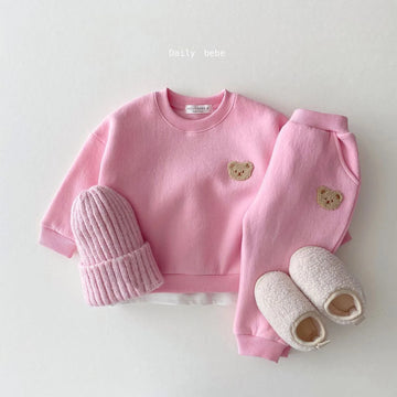 Baby girl wearing winter velvet tracksuit with bear embroidery
